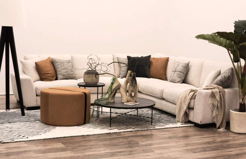 cream white Epic sofa in livingroom environment with accessories.