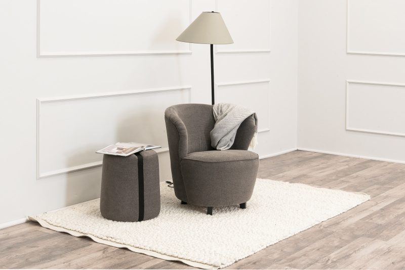IDA armchair and footstool in raymond slit color.